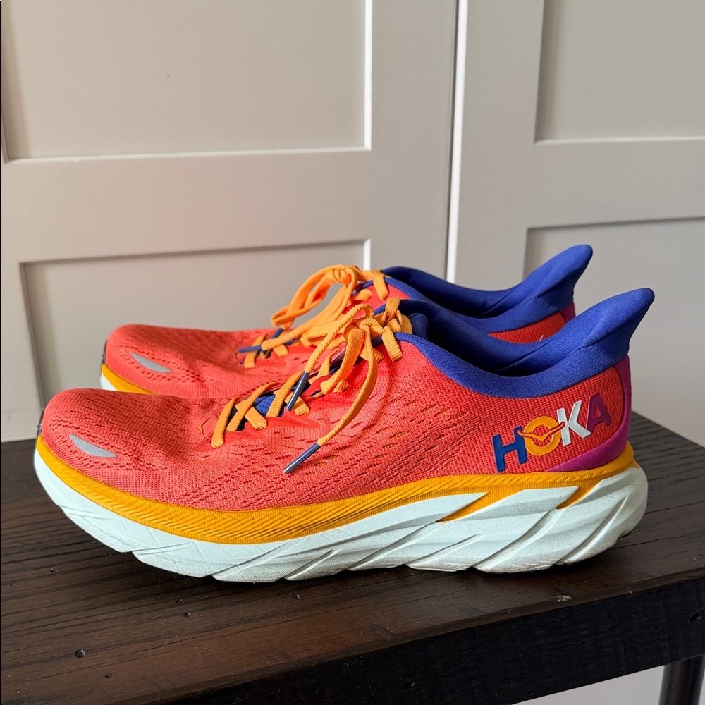 Hoka Vibrant Orange and Purple Athletic Shoes